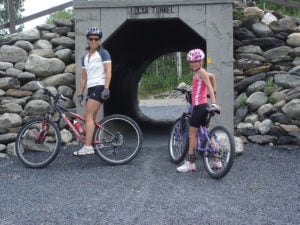 Mom and daughter using FSTA trails for mountain biking