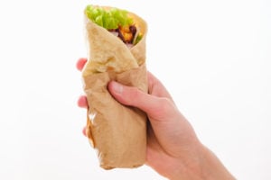 Taco wrapped in grease-resistant paper. 